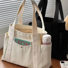Tote bag i canvas med ytterfack