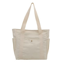 Tote bag i canvas med ytterfack Beige