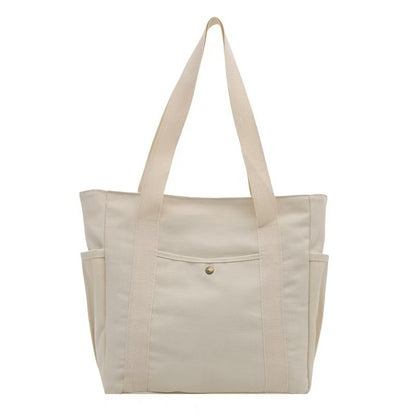 Tote bag i canvas med ytterfack Beige