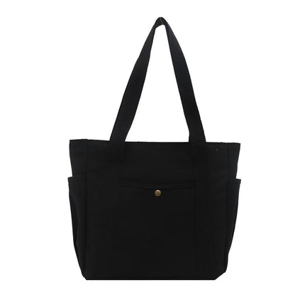 Tote bag i canvas med ytterfack Svart