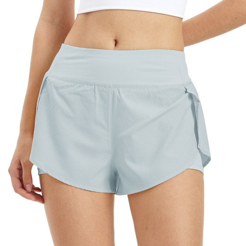 Träningsshorts med inneshorts och mobilficka Ljusblå