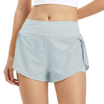 Träningsshorts med inneshorts och mobilficka Ljusblå