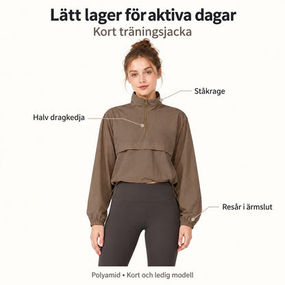 Kort träningsjacka för dam med halv dragkedja